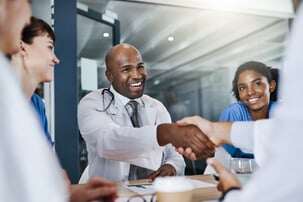 carelogistics_well-done-on-the-successful-surgery-shot-of-docto-2023-11-27-05-10-53-utc